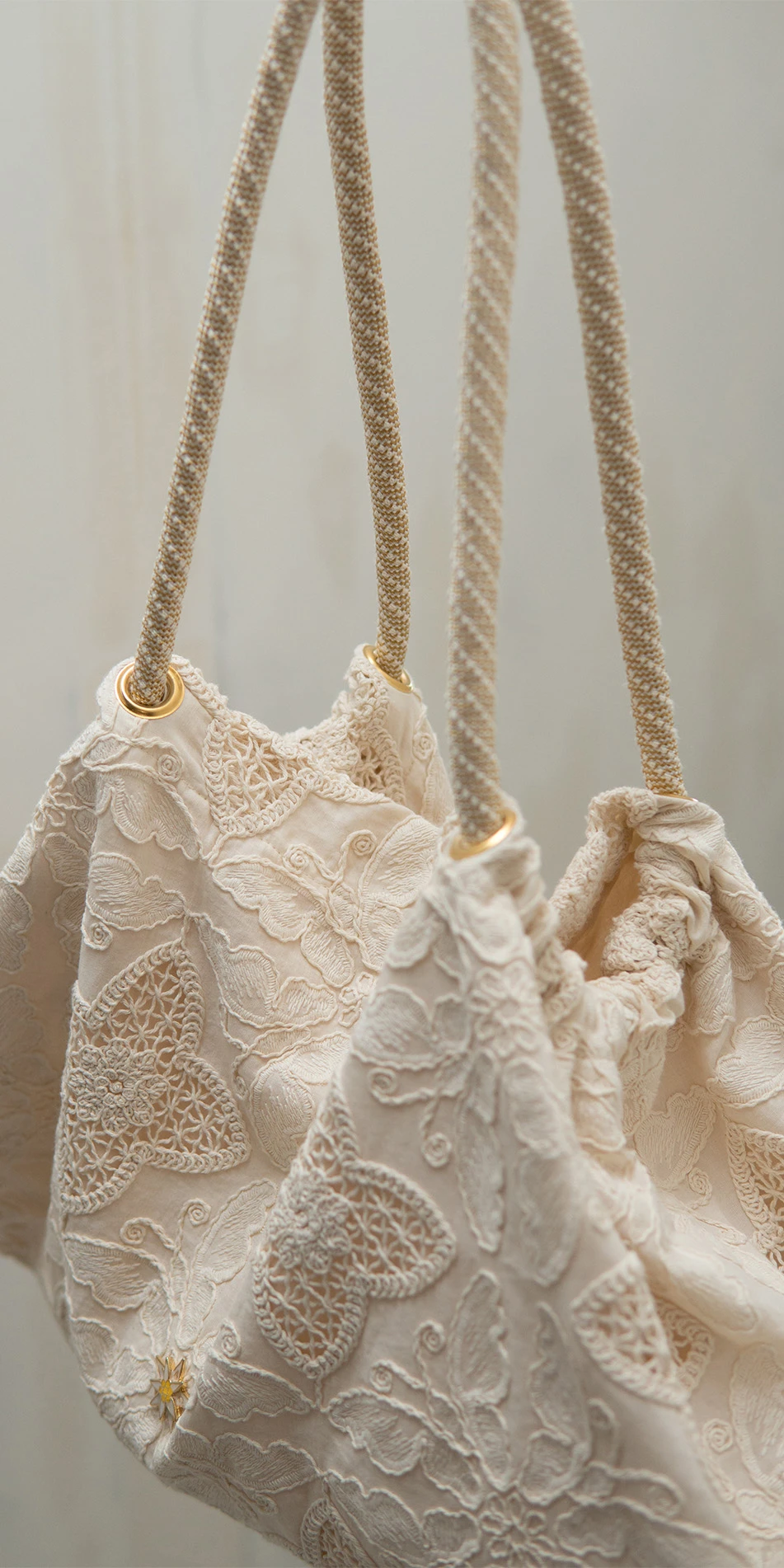 Embroidered cotton tote in cream top view