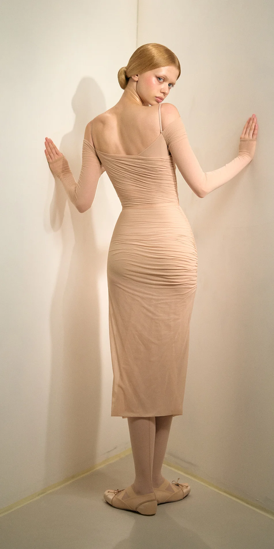 Sheer bodycon midi dress in light beige back view look back