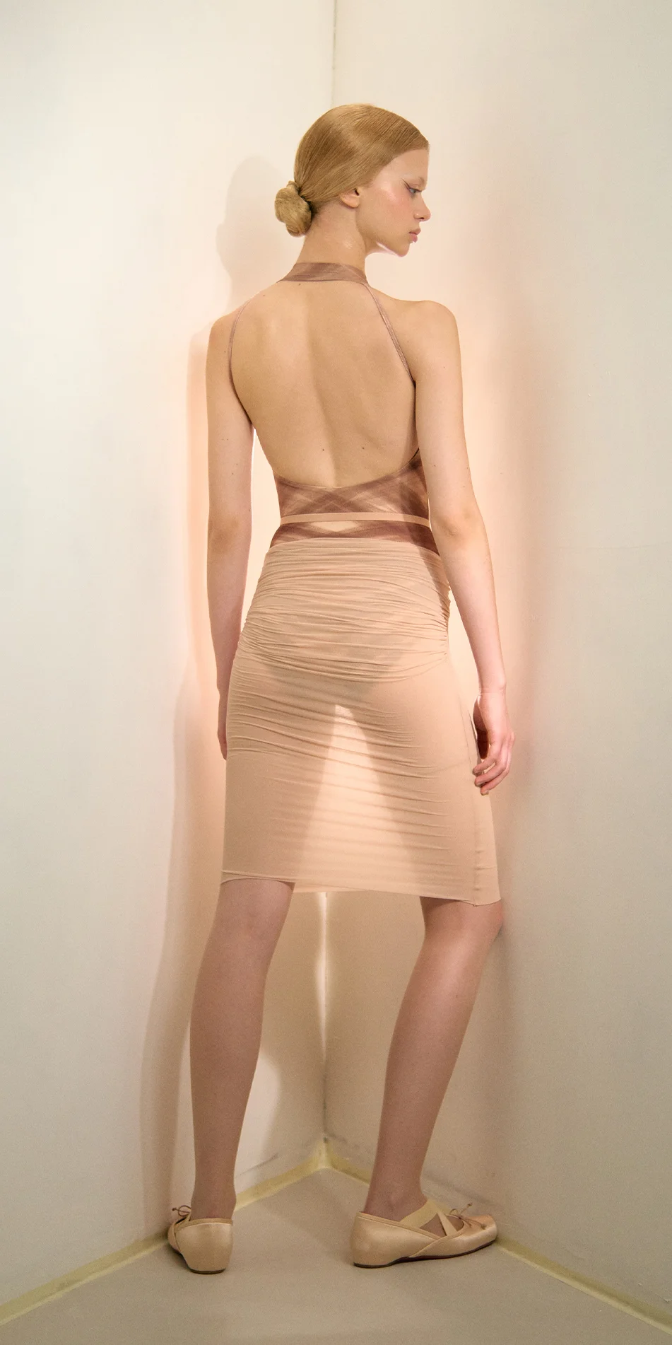 Sheer pencil skirt in light beige back view