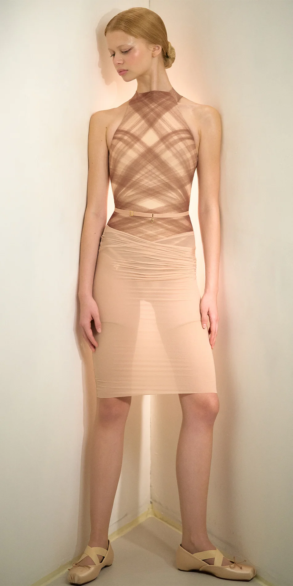 Sheer pencil skirt in light beige full shot with model side look