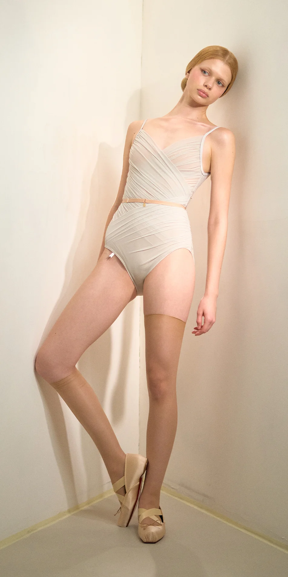 Cache coeur neckline draped leotard in sage green front leaning back