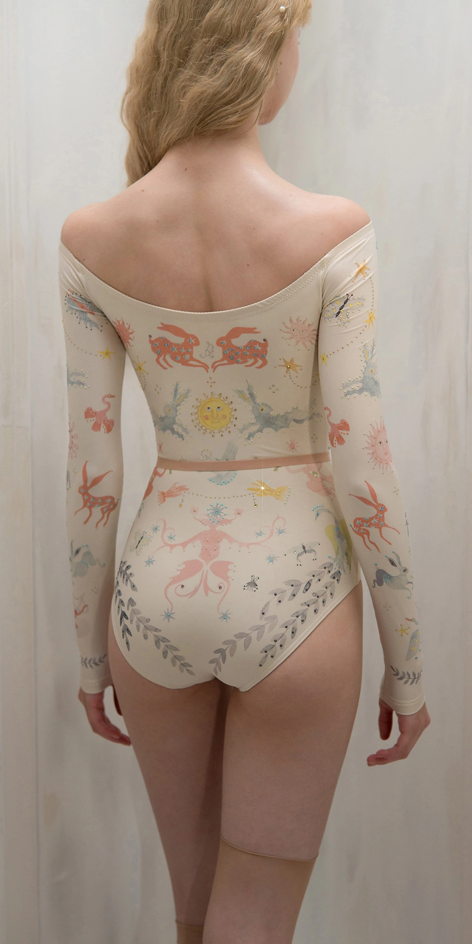 Printed boatneck leotard with rhinestones in cream cropped back 1