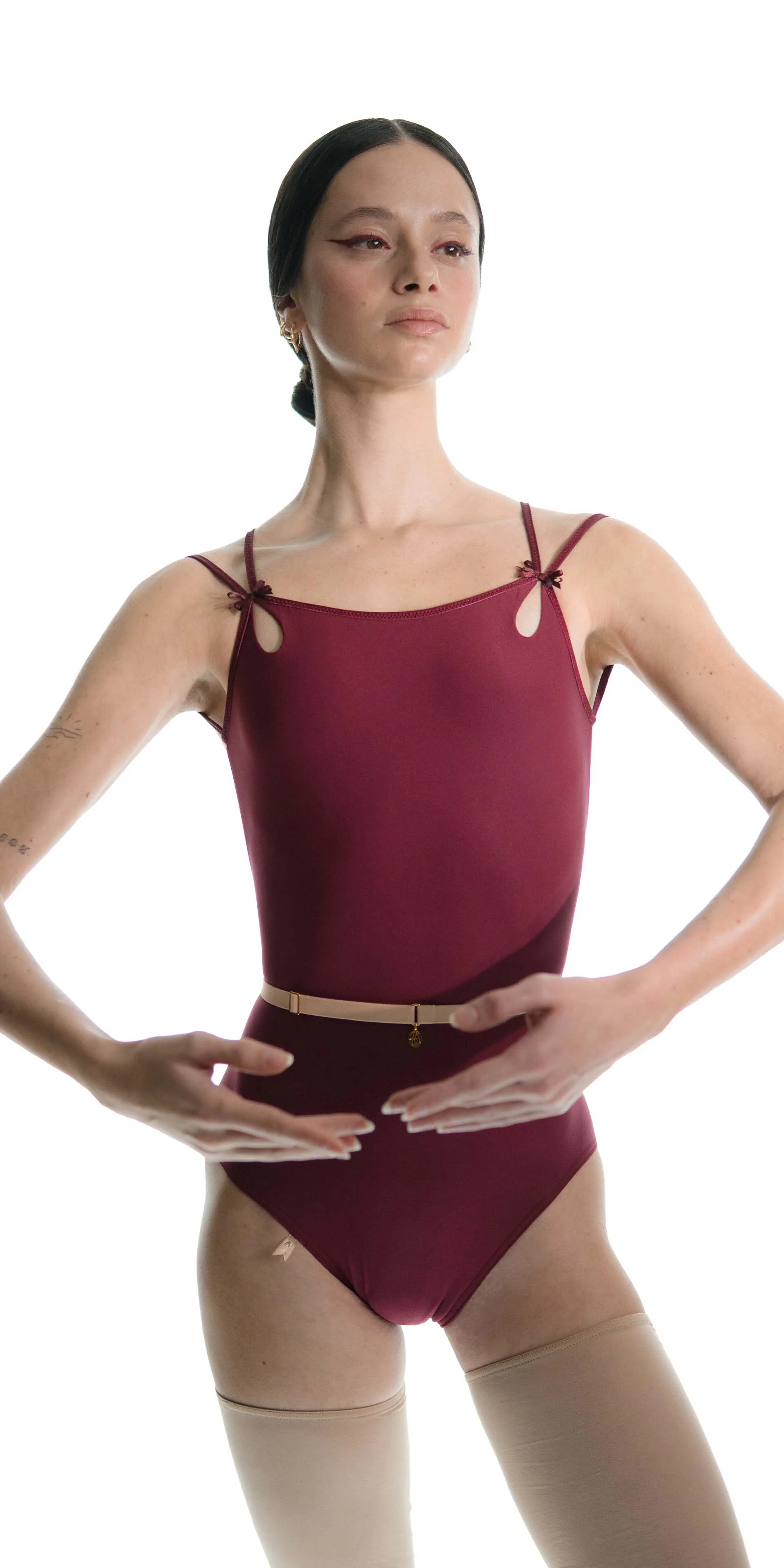 Classic cross back leotard in burgundy front arms in front