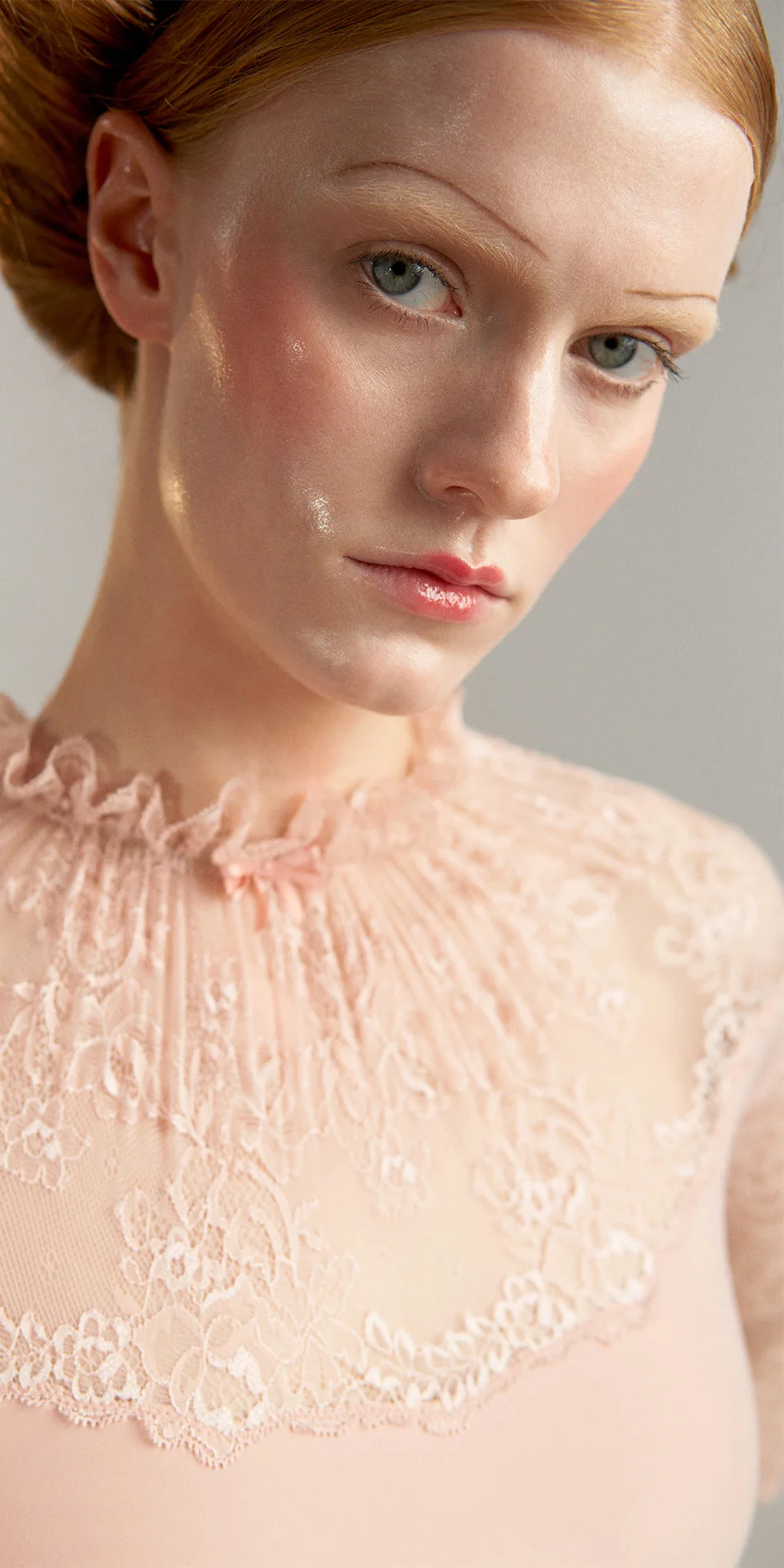 06_Mockneck-leotard-with-bell-sleeves-in-baby-pink-portrait.webp