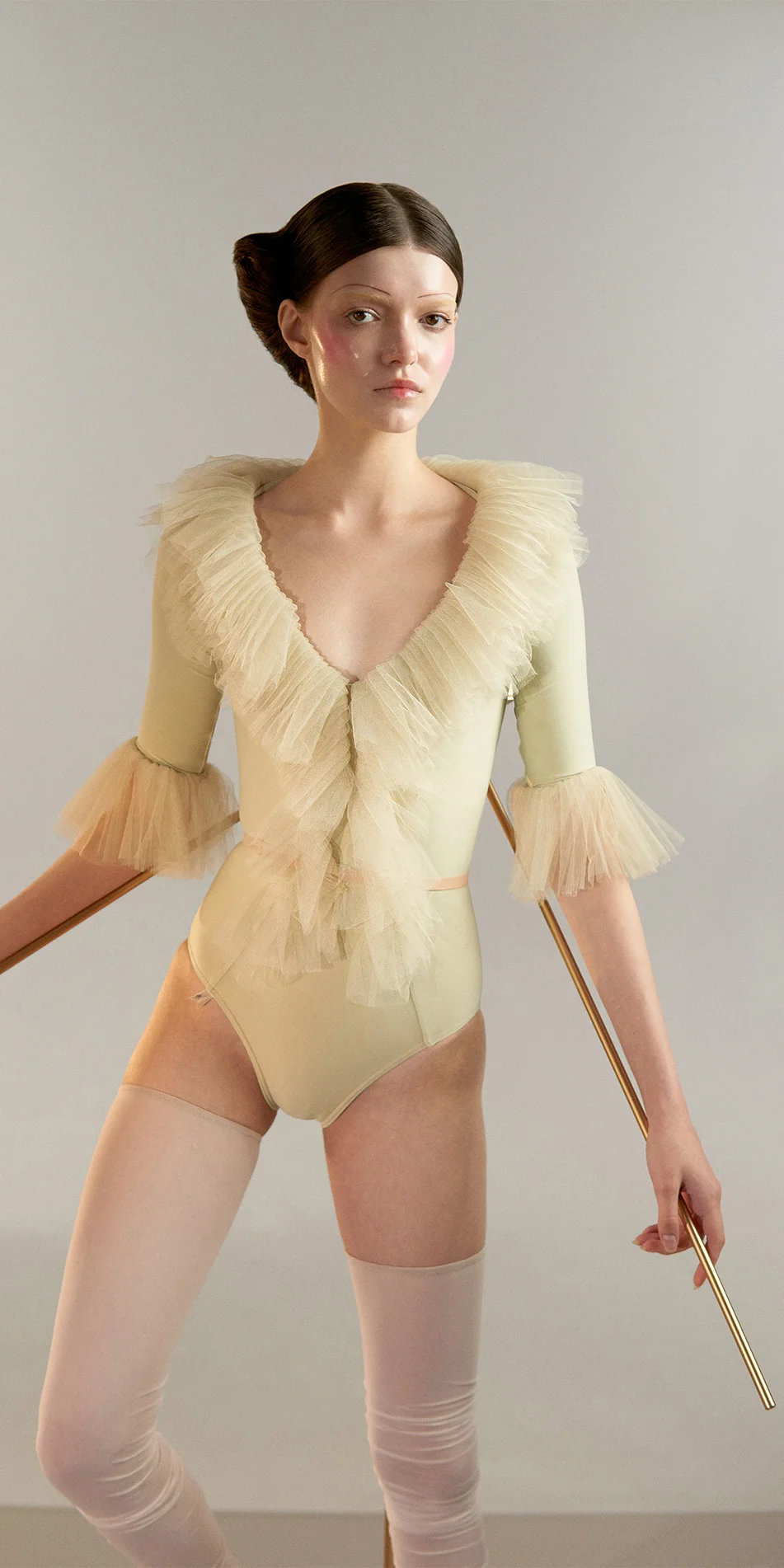 04_Tulle-decollete-leotard-with-sleeves-green-tea-cropped-front-view.webp